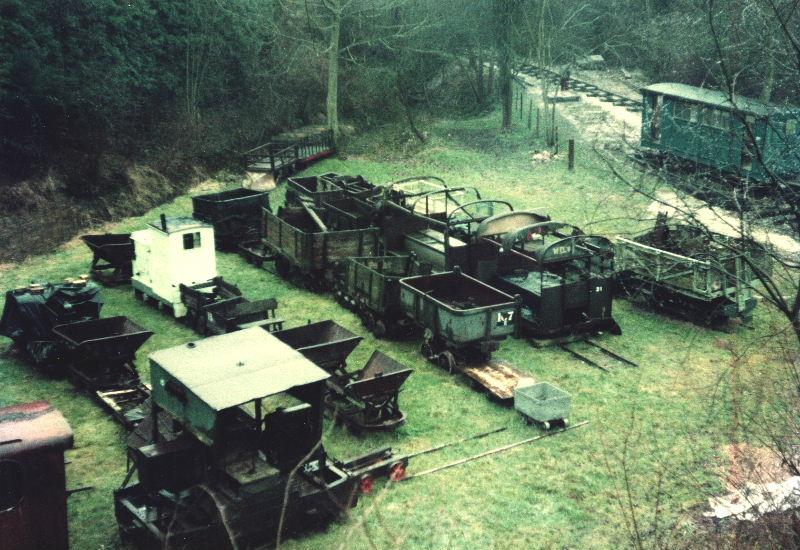 brockham-general-view-070282.jpg - General view of the site - items readily identifiable are the Colne Valley Ruston & Hornsby loco, the two Wickham cars and, in the background, the Fauld bogie coach. Most of the wagons are now on display as part of the Amberley collection.