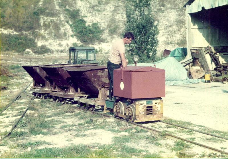 blue-bev-skips.jpg - Another arrival in the form of Wingrove and Rogers BEV T8079 introduced another interesting loco type to the collection. This one had only been built in 1979 and was at the time believed to be the newest lcomotive to have entered preservation in the UK.