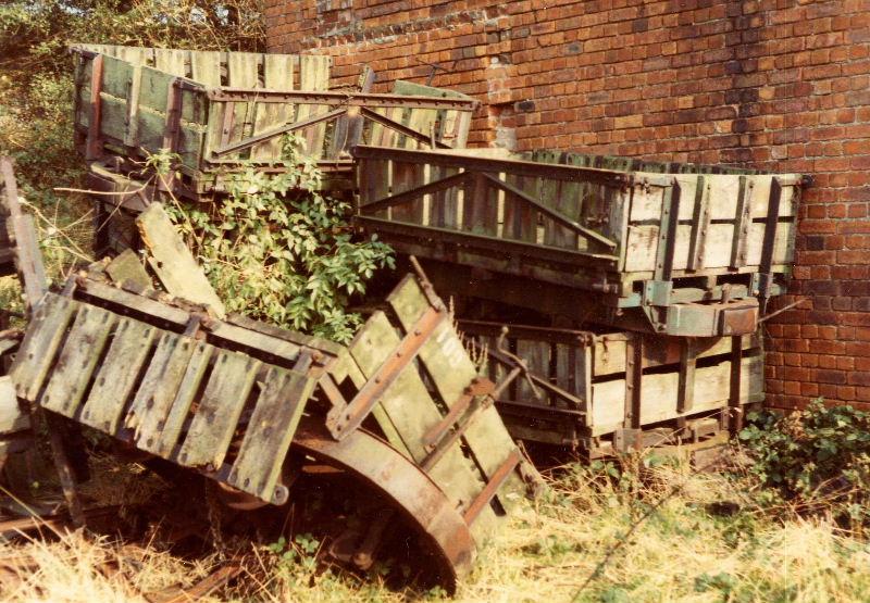 fauldwagons1.jpg - Opportunties to acquire more wagons were taken as and when they arose. The chance to obtain several more Hudson drop-sided wagons from Ripley, Surrey saw a group from the Museum choosing from a motley selection.