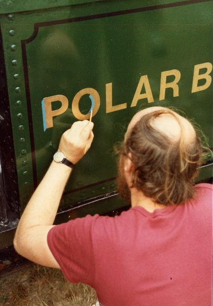 polar-bear-7.jpg - David Smith applies the blue shading to the gold lettering on Polar Bear's tank side.