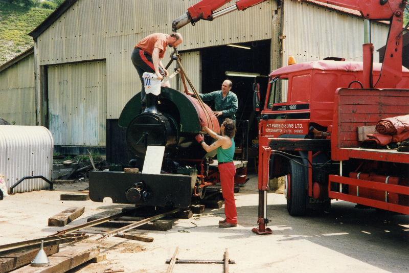 peter-and-tank-4.jpg - The tank is lowered into place with David Smith on top making the final positioning adjustments.